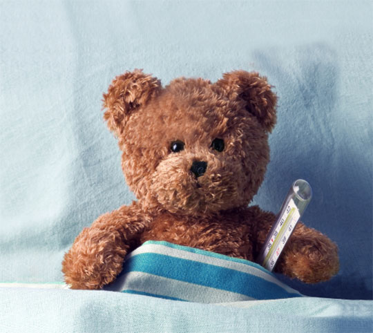 Banner: Teddy bear with a thermometer