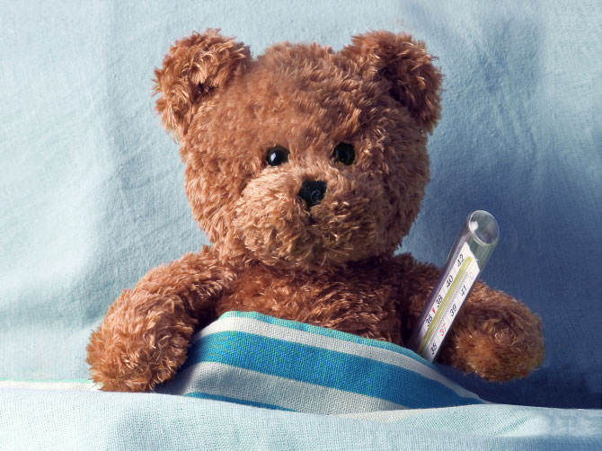 Banner: Teddy bear with a thermometer