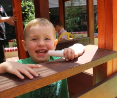 Smiling toddler boy in playground